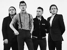 alt="all 4 band members of the Arctic Monkeys"